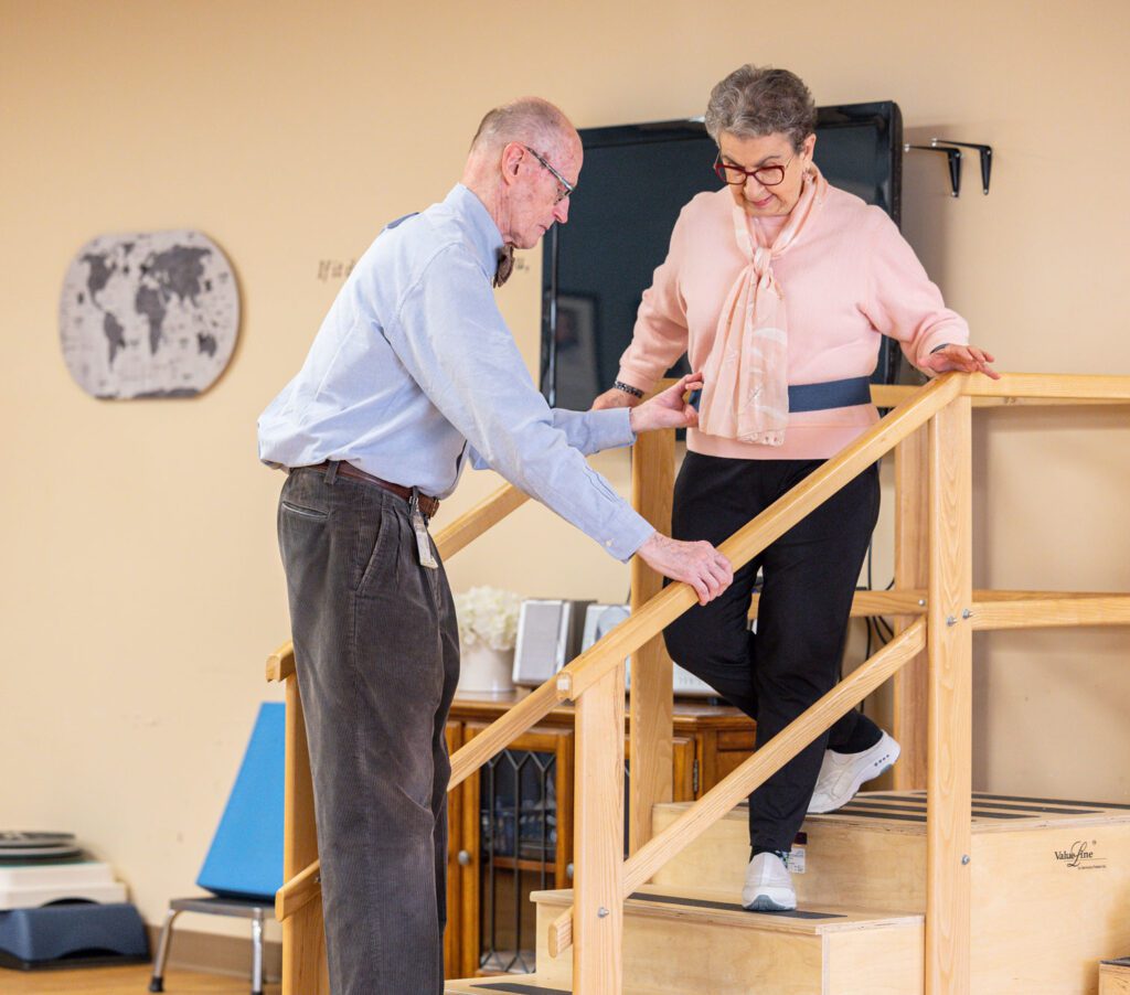 Photo of Rehab patient on steps